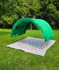 Rainforest Green tie-dye Suniela SolarCotton™ shade cabana set up for a beach picnic