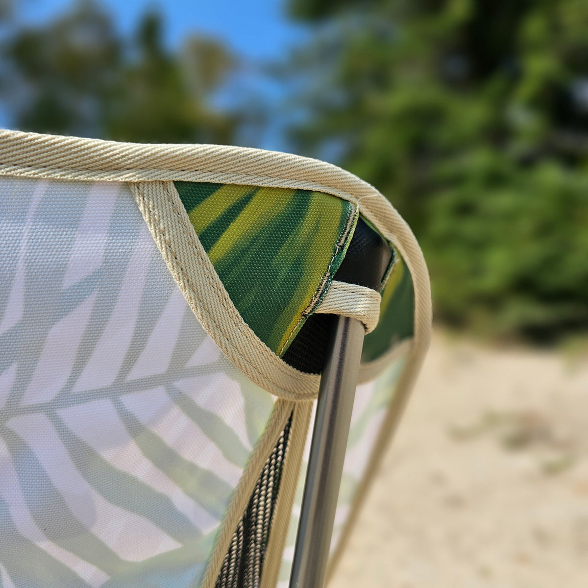 Ultra-lightweight packable outdoor chair by Suniela Beach folded into its compact carry bag